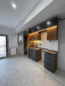 Türker Emlak I Hastane Karşısı 1+1 Sıfır , Asansör , Otopark