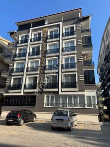 Didim'in Tam Merkezinde Asansörlü Yeni Binada 3+1 Ayrı Mutfak Daire