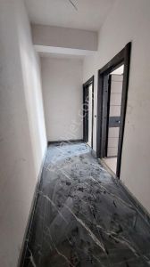 Tacin Mahallesi'nde Satılık 2+1 Ara Kat Daire