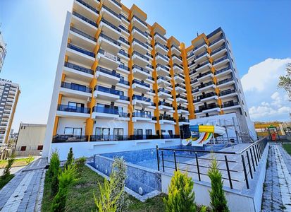 Tüzün'den Tömük'de 1+1 Farklı Kat Ve Cephelerde Satılık Daireler