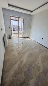 Şehitler Bulvarı Üst Sokağında Satılık 2+0 Ara Kat