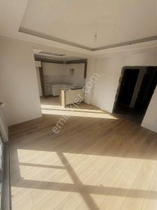 Döşemealtı Yeniköy Merkez De Satılık Lüx Katta 1+1