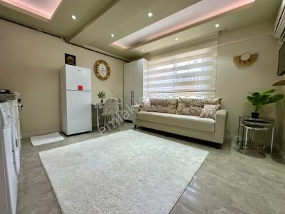 Ender Uysal Gayrimenkulden Asmalı Evlerde Satılık 1+1 Klimalı Apart..