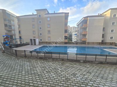 Tırpan'dan Halitpaşa'da Bayırı Olmayan Havuzlu 2+1 Satılık Daire