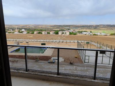 New Life'den 450 Evlerde Satılık 1+1 2. Kat Havuzlu Fırsat Daire