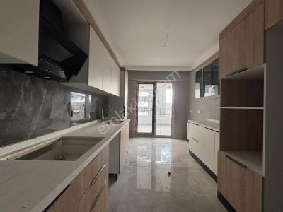 Koza Emlak'tan Saraycık Asm Yapı Da Tam Güvenlikli 3+1 Ara Katta Geniş Odalı Daire