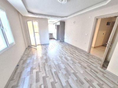 Kuşadasında Havuzlu Sitede 2+1 Eşyasız Kiralıkbahçekat Daire