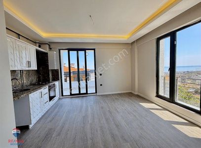 Körfezde Kiralık Sıfır Deniz Manzaralı 1+1 Daire