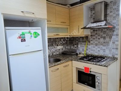 Buca Kampüs Karşısı Eşyalı D.gazlı Bahçeli 1+1 Satılık Daire