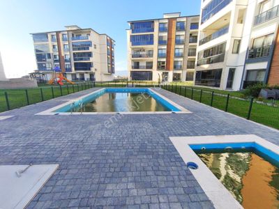 Burhaniye Ören'de Site İçi Aygülden Sıfır Ayrı Mutfak Yerden Isıtma Ebeveyn Banyolu 2+1satılık Daire