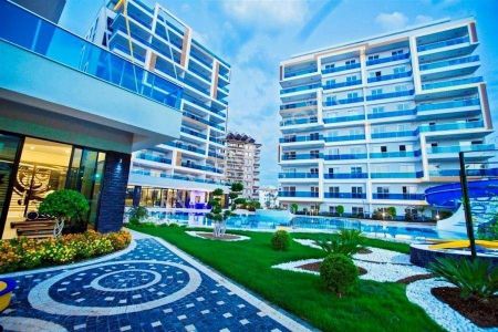 Alanya Tosmur’da Deniz Manzaralı | Eşyalı 1+1 Satılık Daire