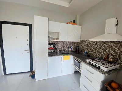 Gültepe'de~caddeye~yürüme~mesafesi~1+1~az~katlı~eşyalı~satılık