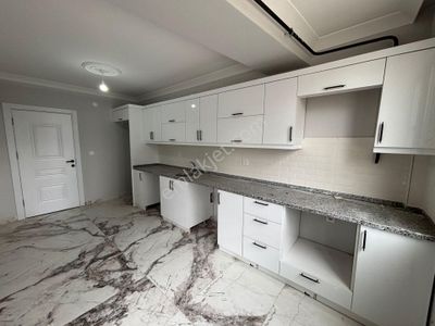 **eryıldız İnşaat'tan**acill Okullar Bölgesinde İskanlı K.otoparklı 115m2 Lüks 2+1