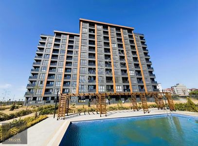 1+1 İskanlı Satılık Daire Uysal Armonia Havuz Cephe