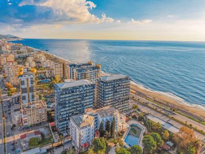 Alanya Mahmutlar’da Denize Sıfır Eşyalı 2+1 Satılık Daire