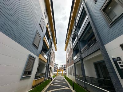 Dora Dan Altınkumda Satılık Sıfır Yüksek Kredili 1+1 Daire