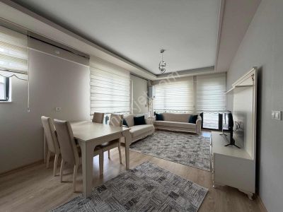 Alaçatı'dan İncek'te Ara Kat Güney Cephe Cambalkonlu Eşyalı 1+1