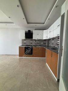 Sarıçam Osmangazi De Site İçinde İskanlı Doğalgazlı Cam Balkonlu 3+1 Satılık Fırsat Dairesi