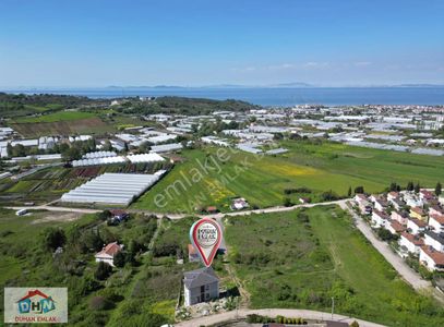 Duhan Emlak'tan Akköy'de 303m2 Full Deniz Mazaralı İmarlı Arsa