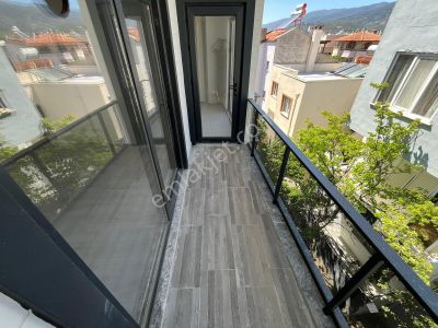 Yükselden Fırsat! Akçayda Sıfır Binada Geniş M2 Lüks Satılık 1+1