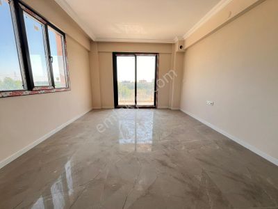 Akgedik Zeki Emlak'tan Manisa Akgedik Mahallesinde Site İçinde Satılık 2+1 Kapalı Mutfak Daire