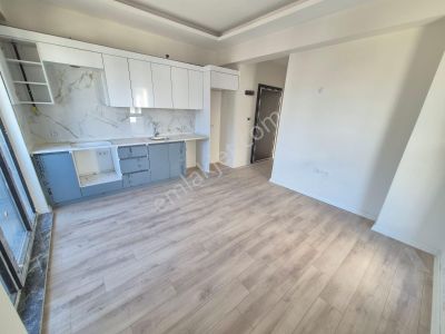 Delux'den Palm Suıts'te Cadde Cepheli Lux Satılık 1+1 Daire