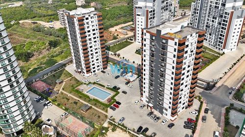 Win'den Akdeniz'de Kısmi Deniz Manzaralı Geniş Satılık 2+1 Daire