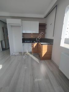 Birlik Ten Çukurova Fırın Civarı 1+1 İskanlı Hasarsız Cepheleri Açık Kaçırırlmayacak Daire