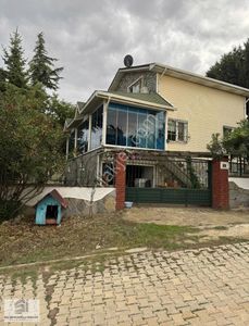 Şekercioğlu Gayrımenkul'den İmarlı Arsa İçinde Satılık Ahşap Ev