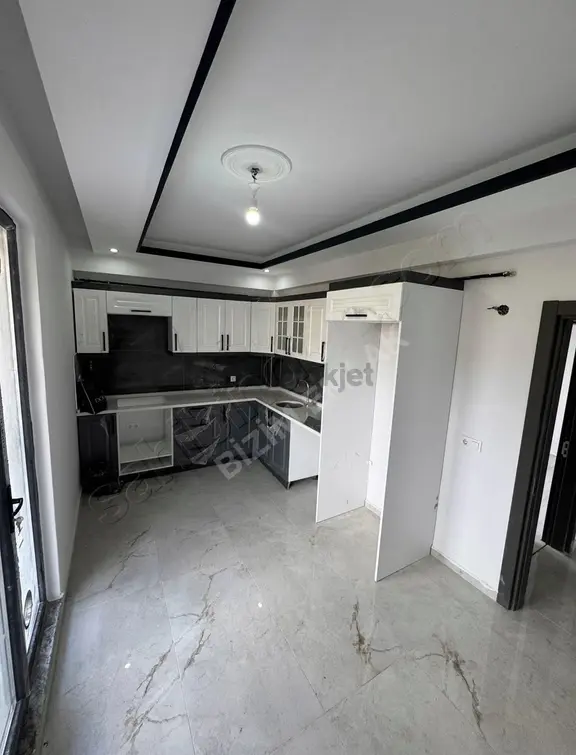Bizim Emlaktan // Başiskele Site İçi Havuzlu Daire 3+1 Daire 2