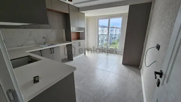 Göçmen Gayrimenkul'den Yeni Mah.sıfır Lüks Satılık Daire 1