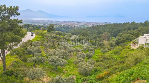 Kuşadasında İmara Teğet Deniz Manzaralı Satılık Arazi 2