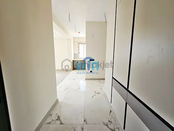 Win'den Çeşmeli'de Prestijli Projede Satılık 2+1 Daire 2