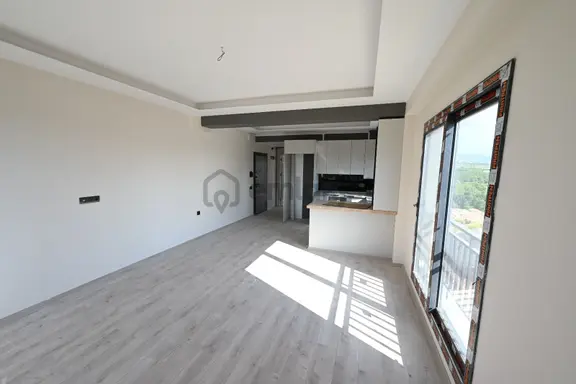 Üstünkent'ten Eski Mezitli'de Sıfır Yapıda Satılık 1+1 Daire 1