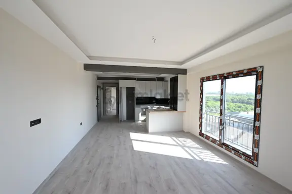 Üstünkent'ten Eski Mezitli'de Sıfır Yapıda Satılık 1+1 Daire 2
