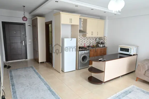 Üstünkent'ten Çiftlikköy'de Full Eşyalı Ferah Oturumlu 1+1 Daire 1