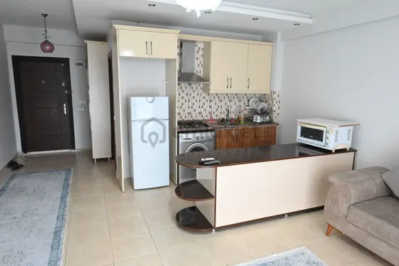 Üstünkent'ten Çiftlikköy'de Full Eşyalı Ferah Oturumlu 1+1 Daire 2