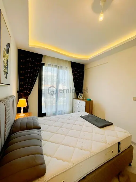 Aydın Kuşadası Davutlar Mahallesi'nde Havuzlu Satılık 2+1 Daire 2