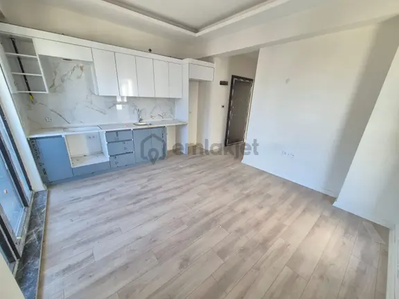 Delux'den Palm Suıts'te Cadde Cepheli Lux Satılık 1+1 Daire 1