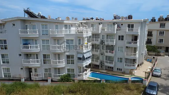 Efeler Mahallesi'nde Havuzlu Sitede Satılık 1+1 Daire 2