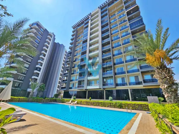 Wın'den Dora Exxen'de Deniz Manzaralı Satılık Geniş 1+1 Daire 1