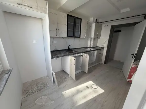 Yağmur Emlaktan Satılık Yüksek Kredili Ara Kat Sıfır 2+1 Daire 1