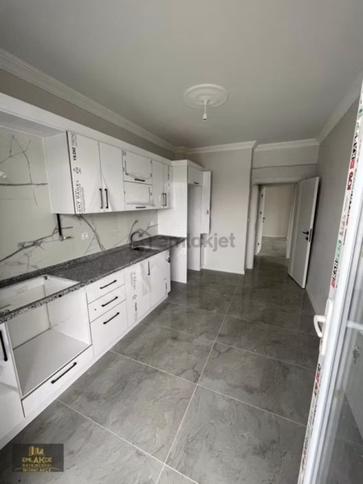 Emlakçe G Y M'den Hanlı Merkez Mahallesinde Satılık 2+1 Daire 1