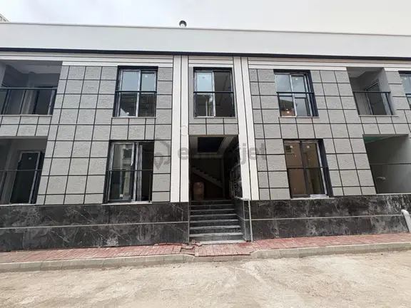 Çiğli Uğur Mumcu Mahallesi’nde Sıfır 2+1 Bahçeli Daire | Giriş Kat | Yatırıma Uygun 1