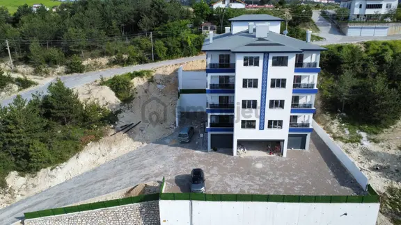 Sıfır Apartman Dairesinde Geniş Bahçeli 2+1 Satılık Daire 1