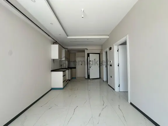 Tuğra'dan Havuzlu Site İçinde Yatay Mimari 1+1 Satılık Daire 2