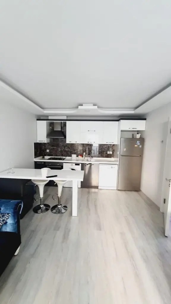 Kuşadası Davutlar'da Havuzlu Kapalı Otoparklı Kiralık 1+1 Daire 2