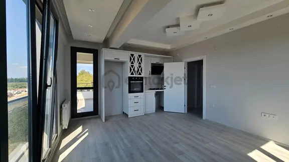 Gömeç Kemalpaşa Mahallesi'nde Cadde Üstü Kiralık Sıfır 2+1 Daire 2