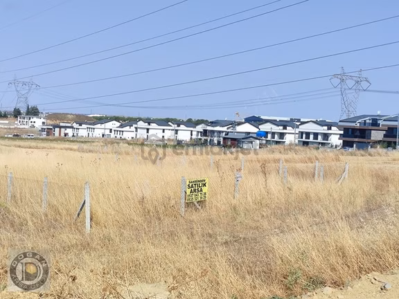 Deniz Manzaralı %50 İmarlı 12 Metre Cadde Cephe Satılık Arsa 1