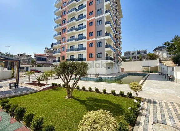 Alanya Avsallar’da Satılık 1+1 Havuz Manzaralı Köşe Daire Son Fırsat! 1